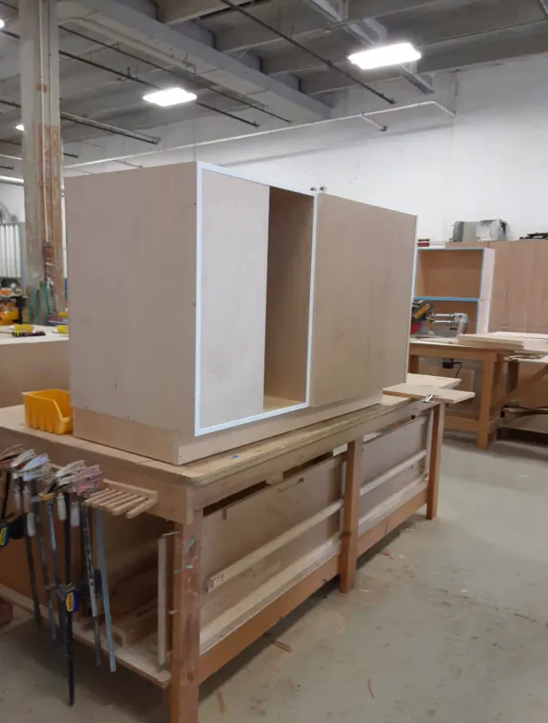 A cabinet being built on the workshop bench
